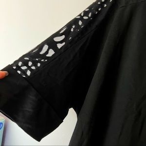 Black cut out illusion top